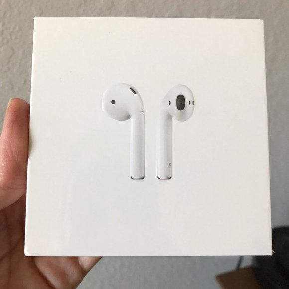 New in Box Apple Airpods with charging case. Second Generation A2032